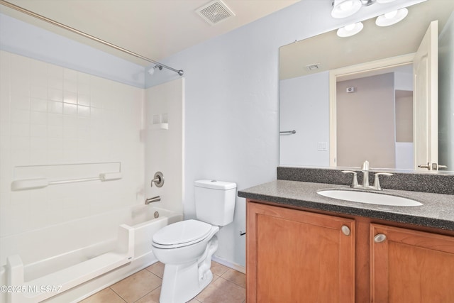 full bathroom featuring vanity, tub / shower combination, tile patterned floors, and toilet