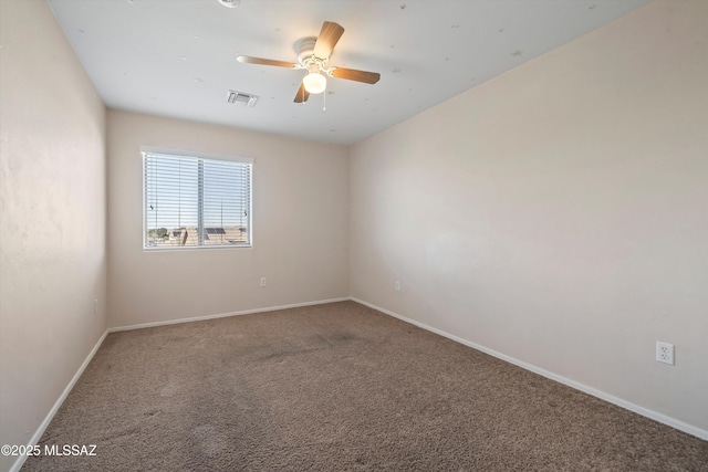 carpeted empty room with ceiling fan