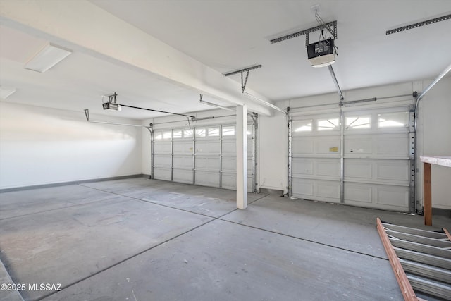 garage featuring a garage door opener