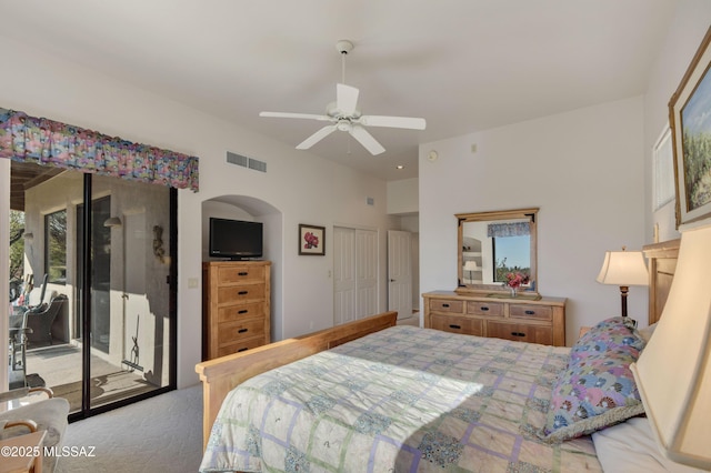 carpeted bedroom featuring ceiling fan and access to outside