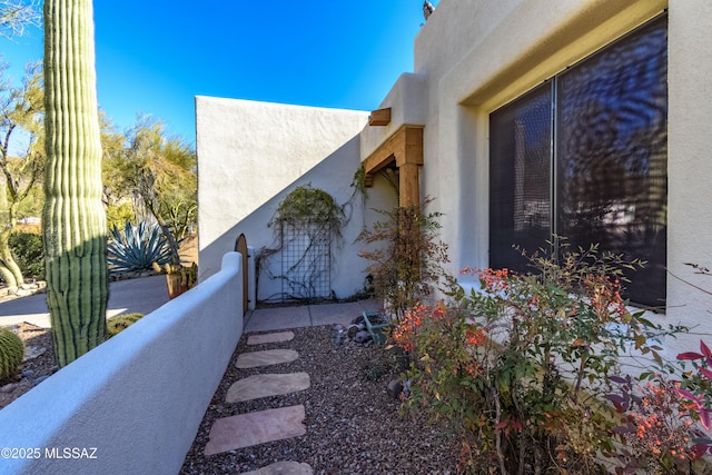 view of home's exterior featuring a balcony