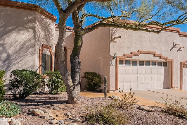 view of property exterior with a garage