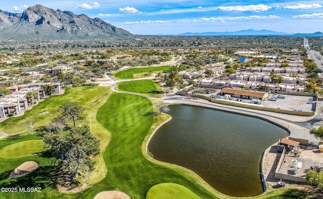 birds eye view of property featuring a water and mountain view