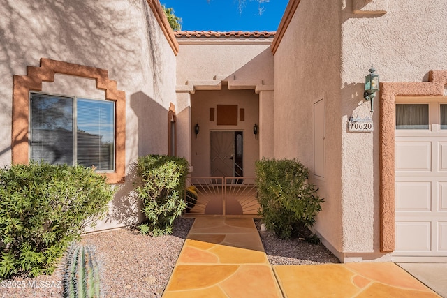 property entrance featuring a garage