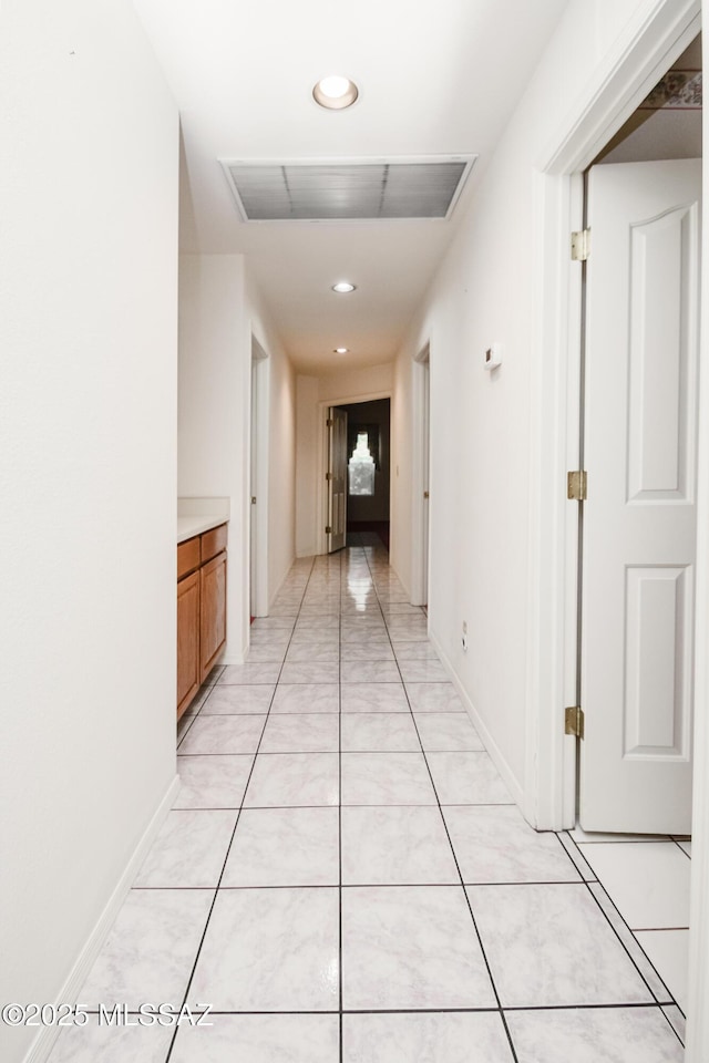 1524 W Sunridge Dr, Tucson, AZ 85704 - hallway with recessed lighting, light tile patterned floors, visible vents, and baseboards