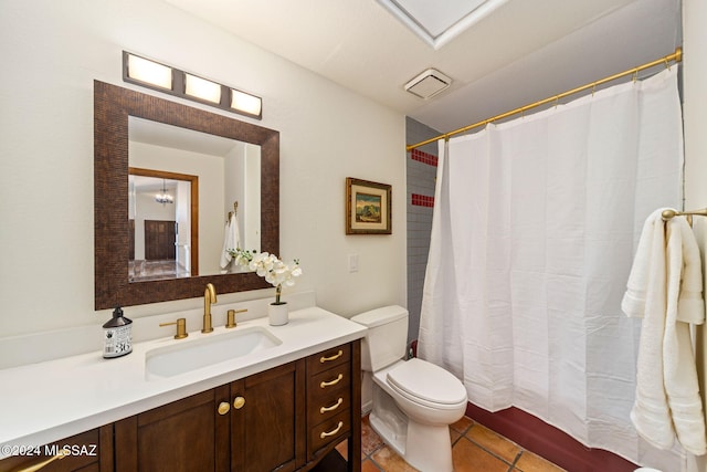 bathroom featuring tile patterned flooring, vanity, toilet, and a shower with shower curtain