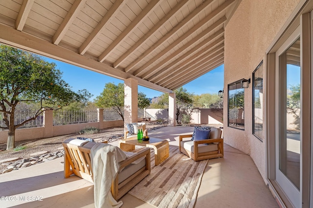 view of patio / terrace featuring an outdoor living space and a fenced backyard