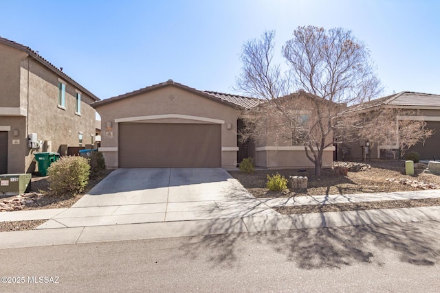 view of front of home with a garage