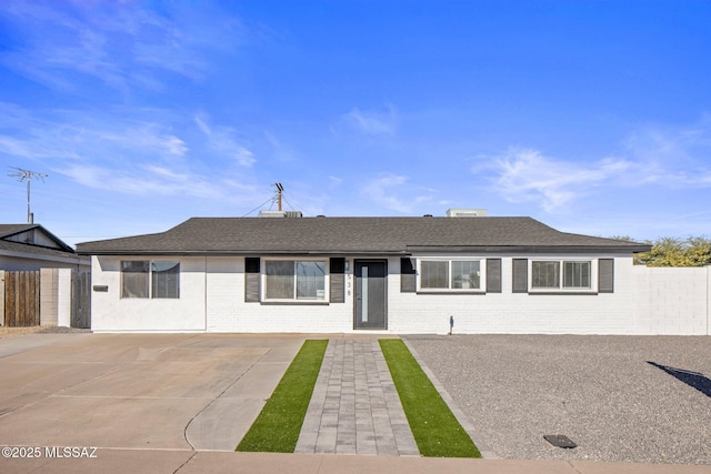 single story home featuring a patio