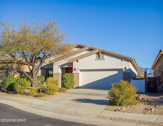 view of front of property with a garage