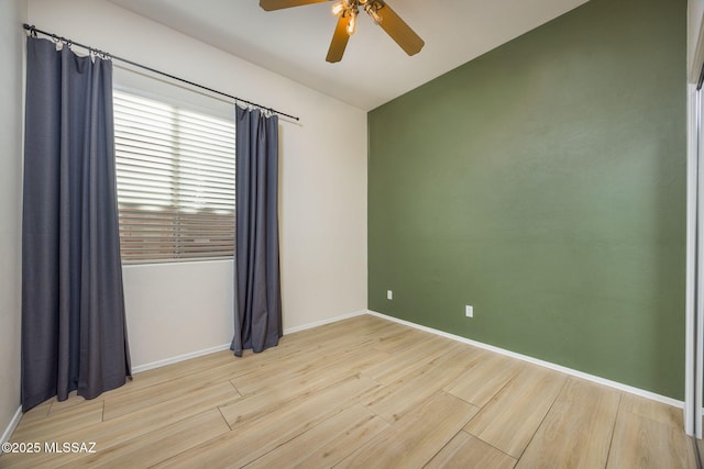 spare room featuring ceiling fan