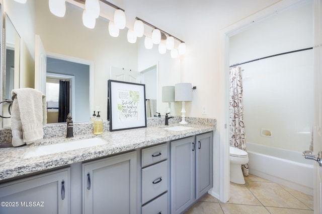 full bathroom featuring vanity, shower / tub combo with curtain, tile patterned floors, and toilet