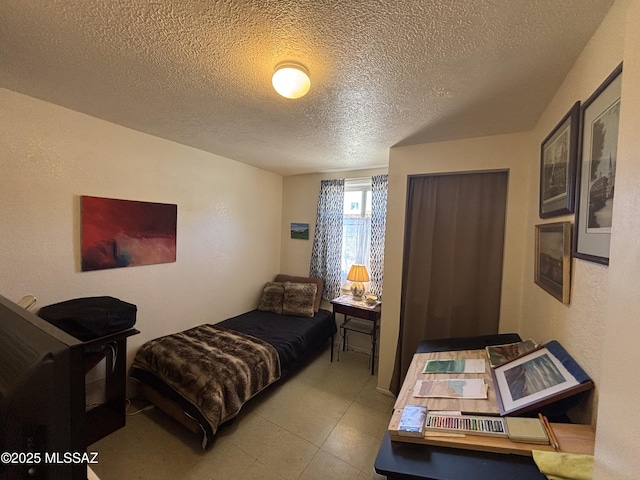 bedroom with a textured ceiling