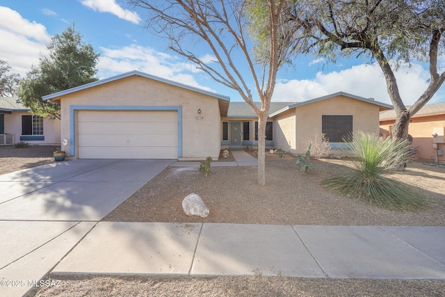 single story home featuring a garage