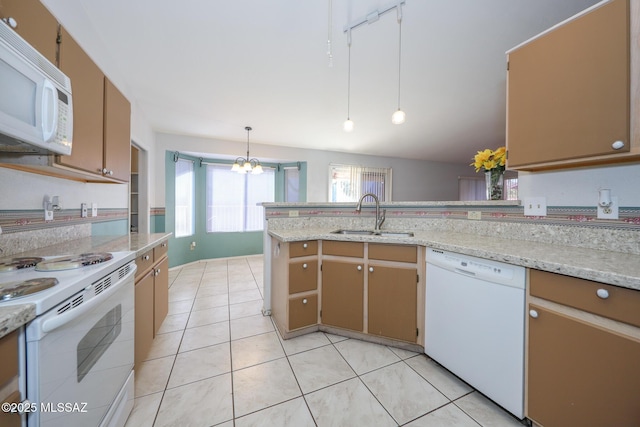 kitchen featuring sink, white appliances, light tile patterned floors, hanging light fixtures, and light stone countertops