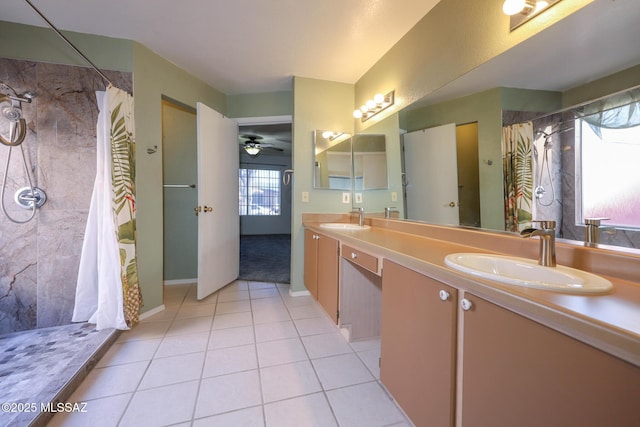 bathroom with vanity, tile patterned flooring, curtained shower, and ceiling fan