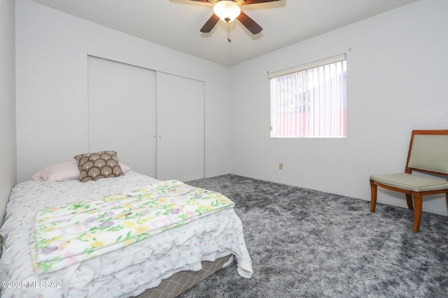 bedroom with a closet, ceiling fan, and carpet