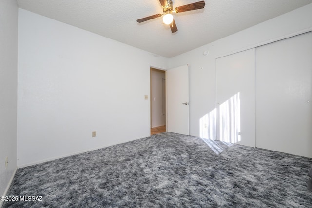 unfurnished bedroom with a closet, ceiling fan, and carpet flooring