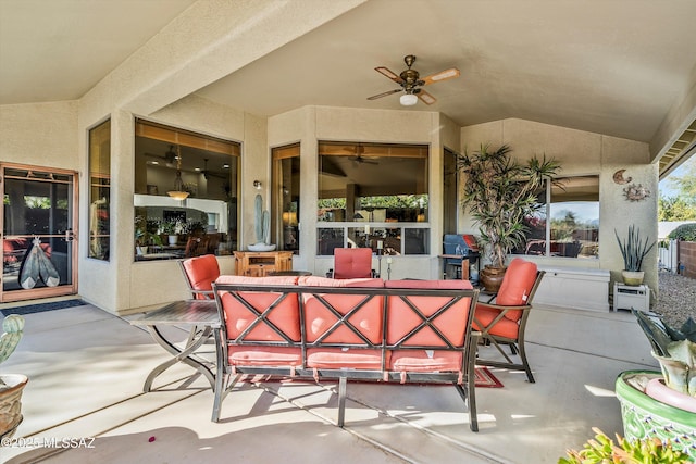 view of patio with outdoor lounge area and ceiling fan