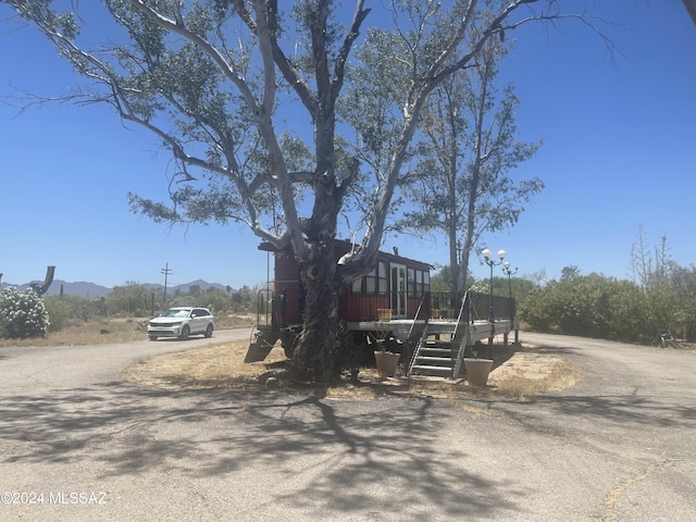 view of jungle gym with a mountain view