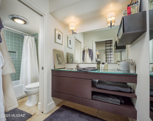 full bathroom with vanity, shower / tub combo with curtain, and toilet