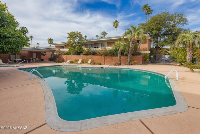 view of pool with a patio area