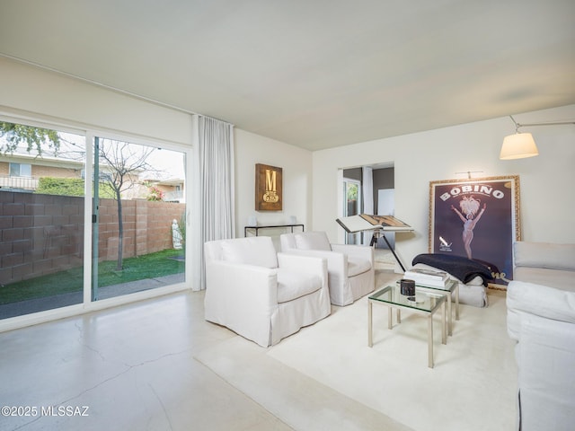 living room with concrete flooring