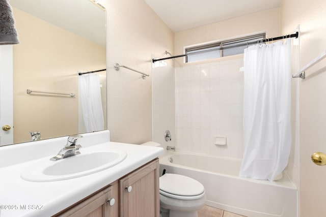 full bathroom featuring vanity, shower / tub combo, and toilet