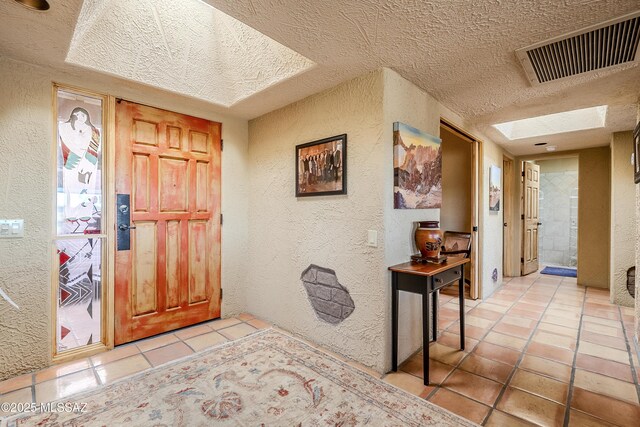 dining space with light tile patterned floors