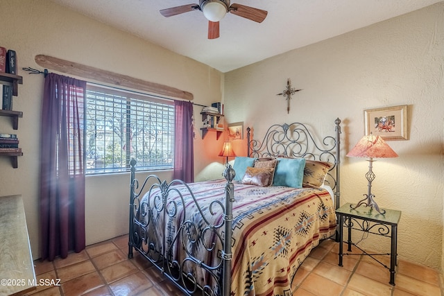 bedroom featuring ceiling fan