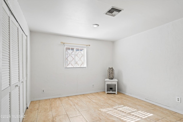 unfurnished bedroom featuring a closet