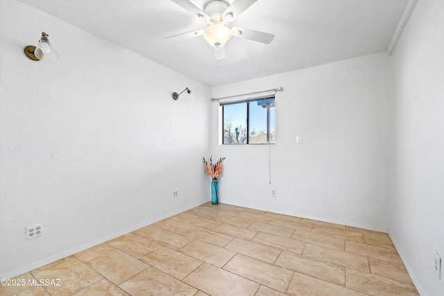 empty room featuring ceiling fan