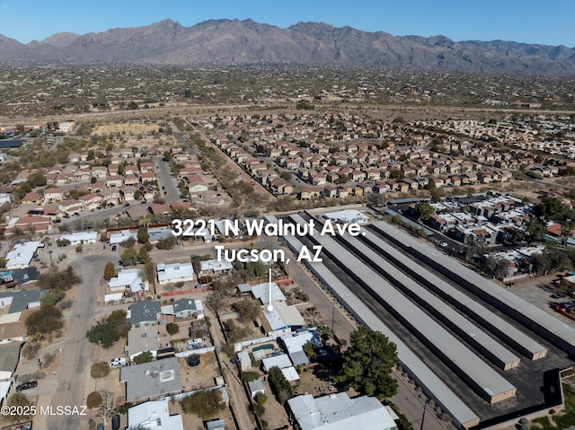 bird's eye view with a mountain view