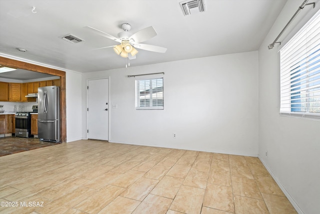 interior space featuring ceiling fan