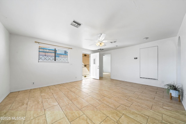 unfurnished room featuring ceiling fan