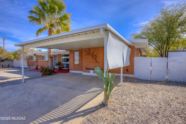 view of front facade with a carport