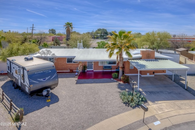 view of front of house with a carport