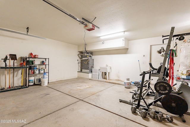 garage featuring a garage door opener