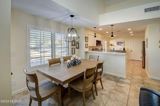 dining room with light tile patterned floors, a chandelier, recessed lighting, visible vents, and baseboards