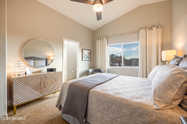 bedroom featuring ceiling fan, vaulted ceiling, and light tile patterned floors