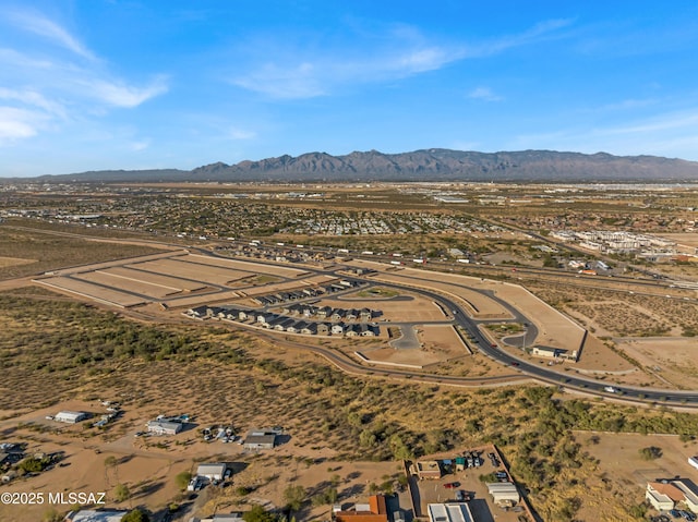 drone / aerial view featuring a mountain view