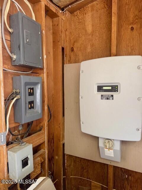 utility room featuring electric panel