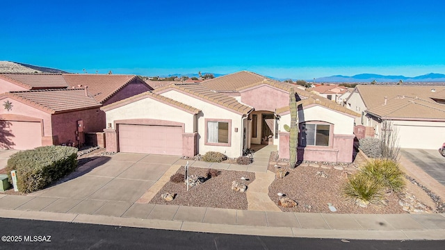 1858 W Via Del Recodo, Green Valley, AZ 85622 - view of front of property with a mountain view and a garage
