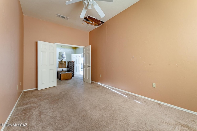 carpeted empty room with ceiling fan