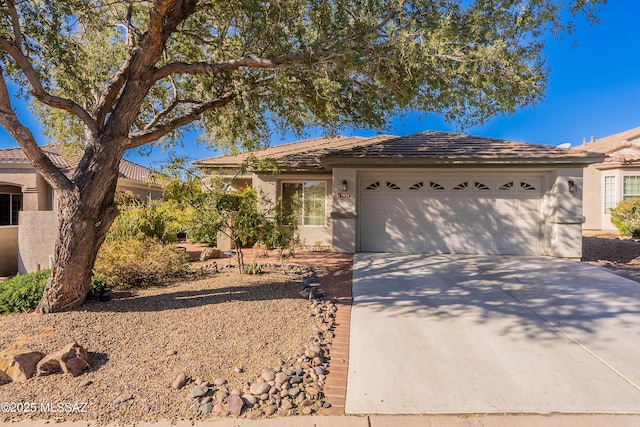 single story home featuring a garage