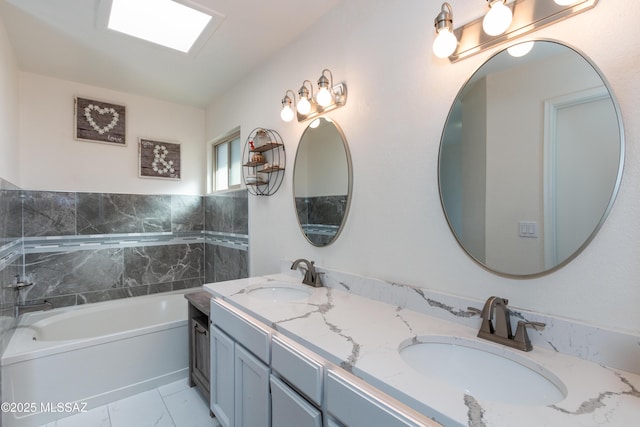 bathroom featuring vanity and a bathing tub