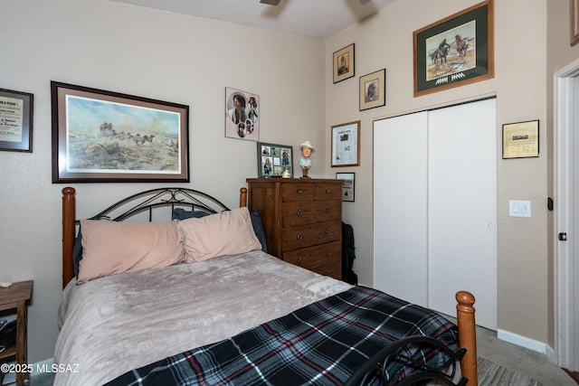 bedroom with a closet and carpet