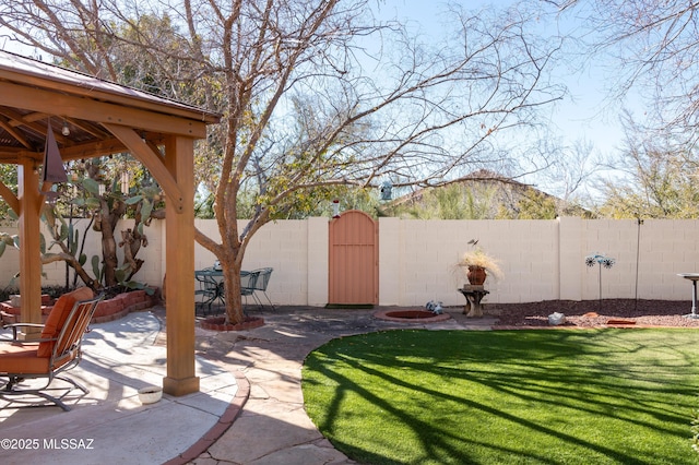 view of yard featuring a gazebo and a patio