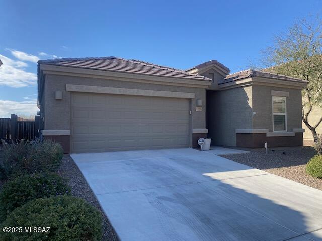 view of front of home with a garage