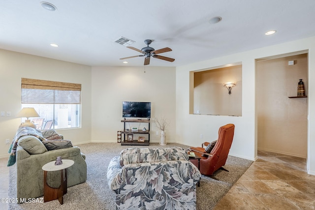 living room featuring ceiling fan